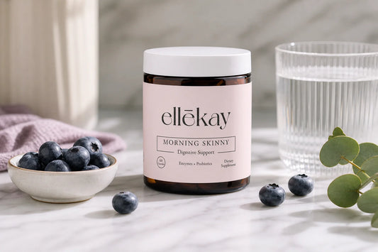 Morning Skinny supplement bottle on a marble counter with fresh berries representing akkermansia muciniphila supplements vs other probiotics for women's gut health