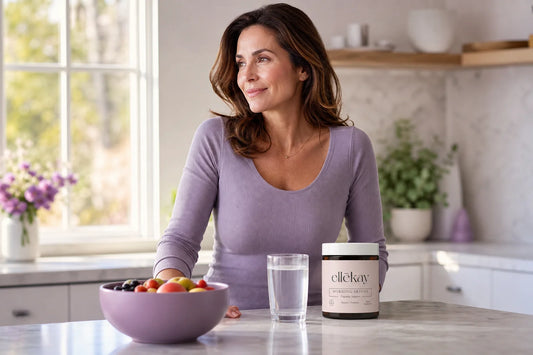 Woman in her 40s with Morning Skinny supplement on a bright kitchen counter, representing digestive enzymes for aging