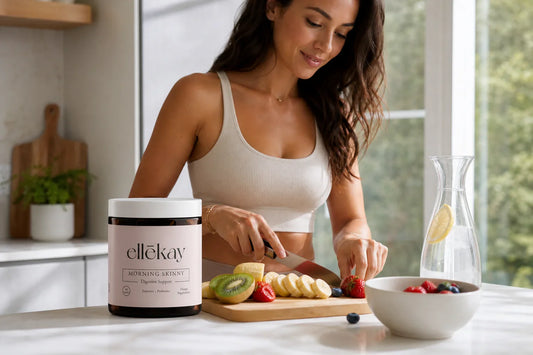 Woman in a bright morning kitchen preparing breakfast with fresh fruit and a glass of water, illustrating how long digestive enzymes take to work