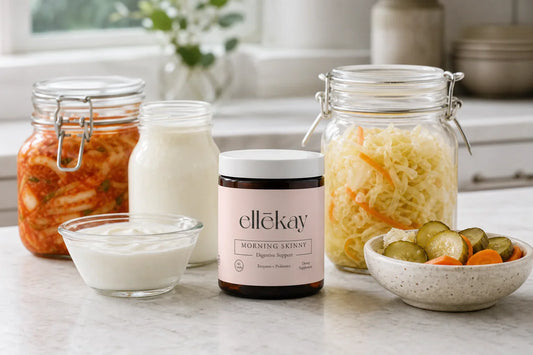 Probiotic-rich foods including yogurt, kefir, kimchi, and fermented vegetables arranged on a bright kitchen counter for a gut health comparison
